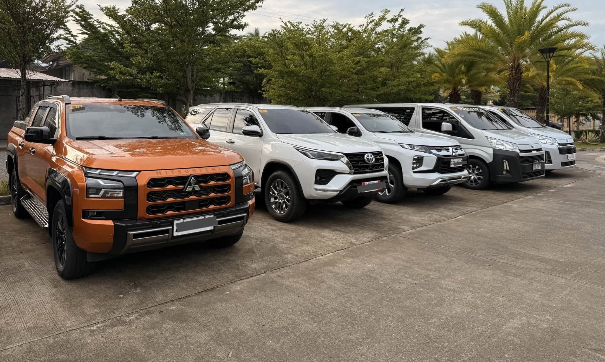 The AllDrive Rent a Car Butuan fleet: pickup, SUVs and vans parked in Butuan City